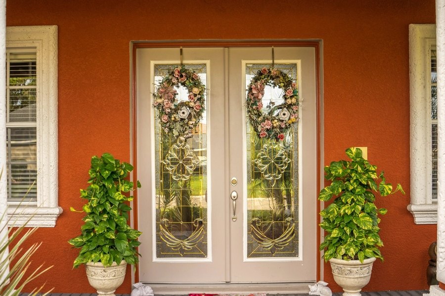 A replacement double entry door with glass inserts