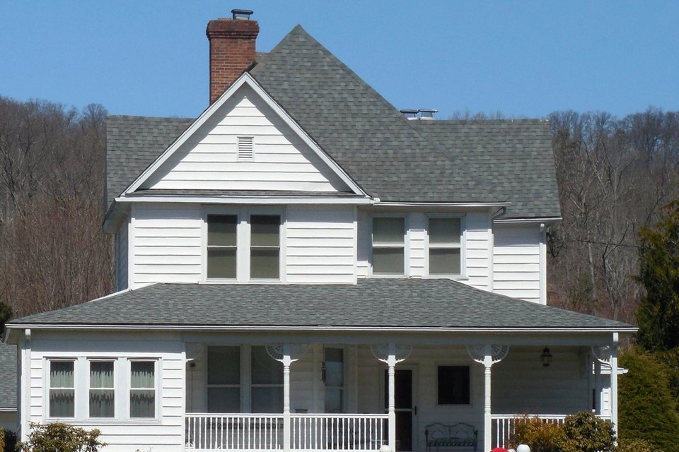 White lap siding, soffit and fascia on a two storey home